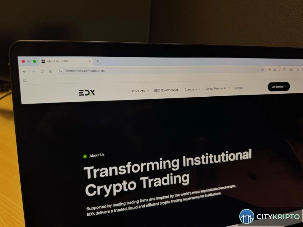Логотип EDX Markets и график роста крипторынка с символами Bitcoin и USDT