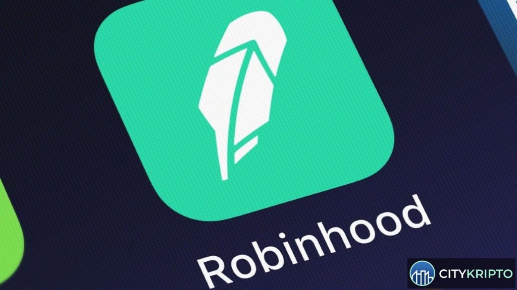 График акций Robinhood и логотип криптообменника в Москве